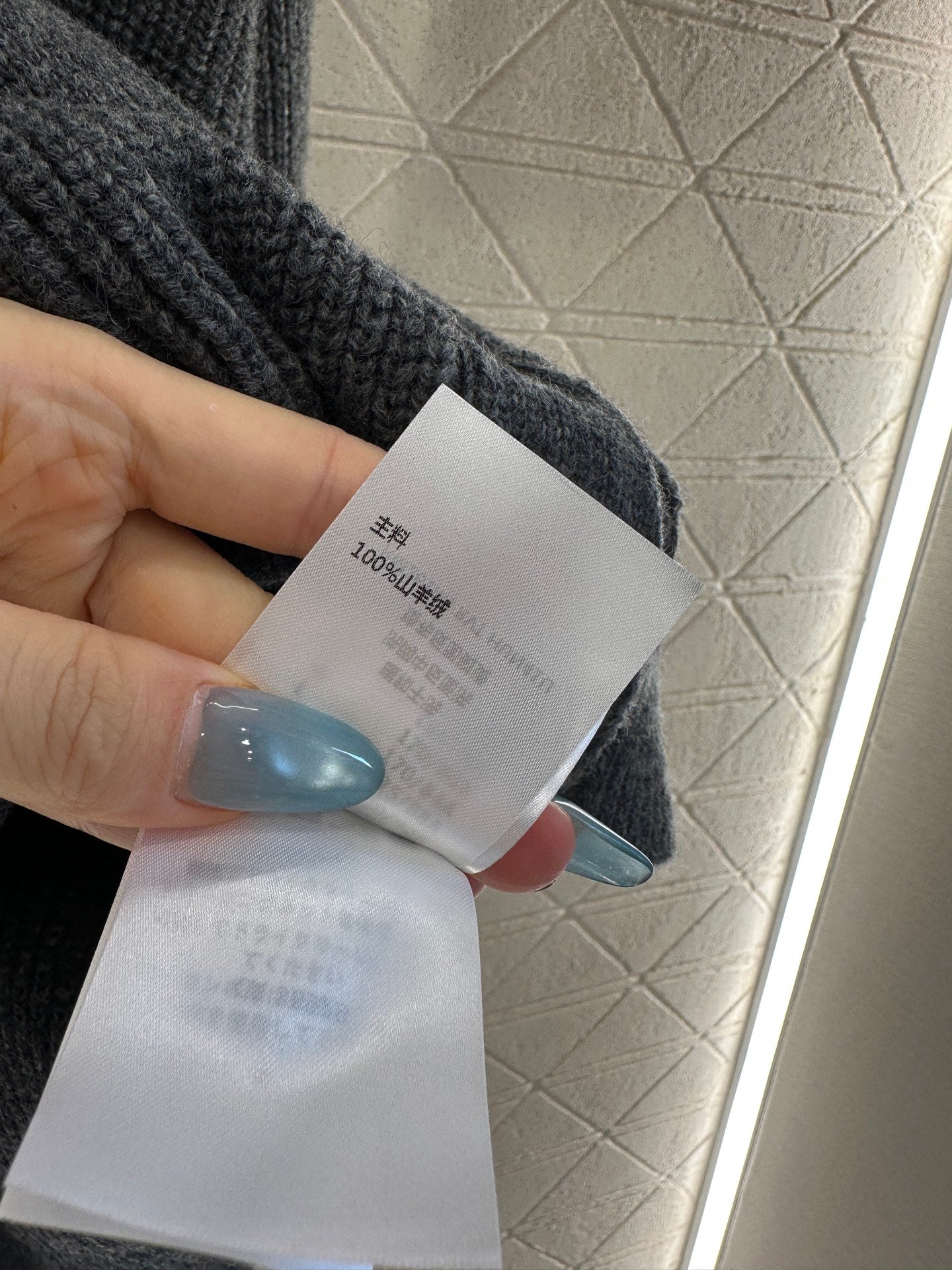 25fw Embroidered pocket knit cardigan with silhouette letters