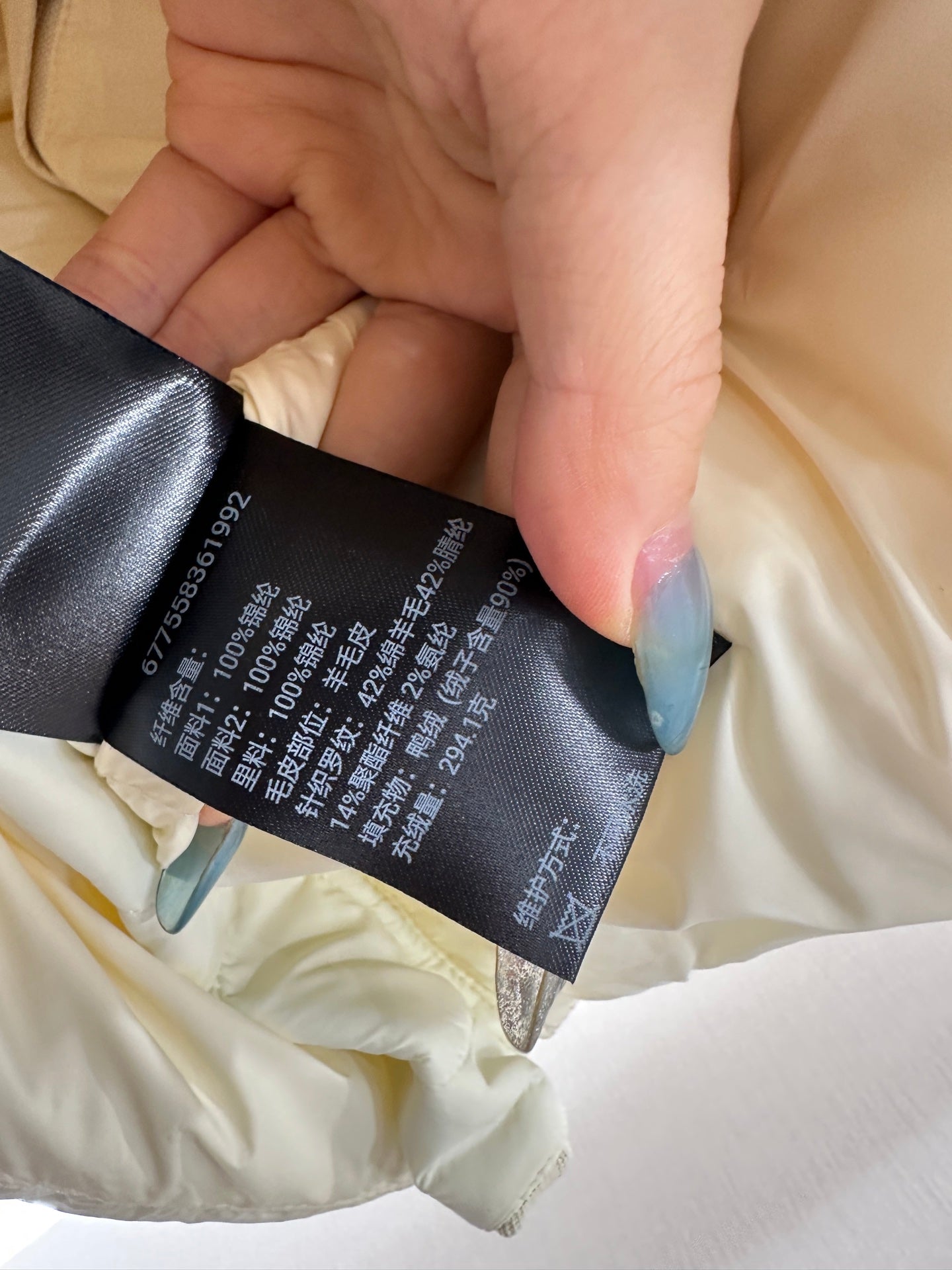 Split fake two-piece down jacket