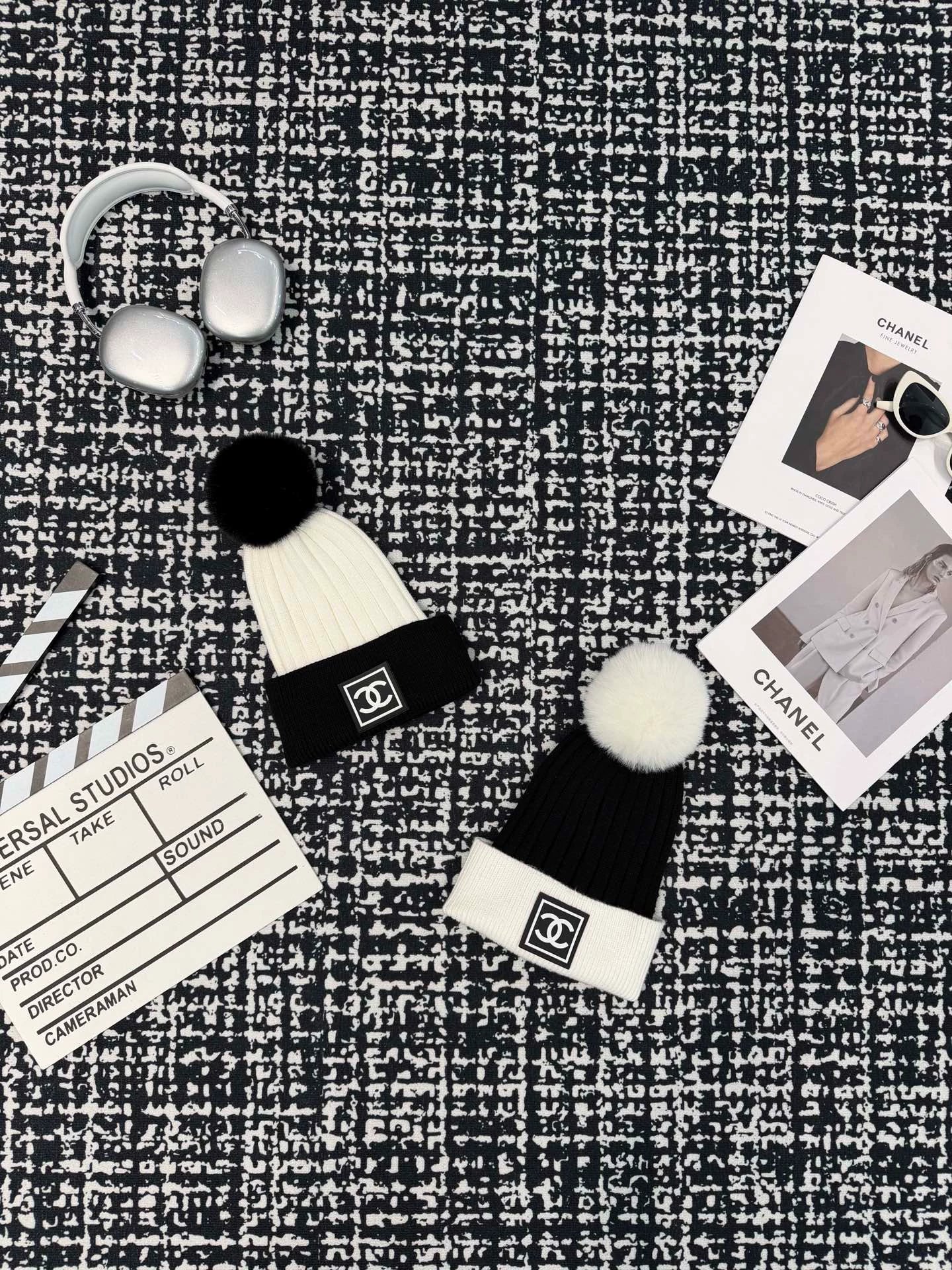 Black and white contrasting ball knitted hat