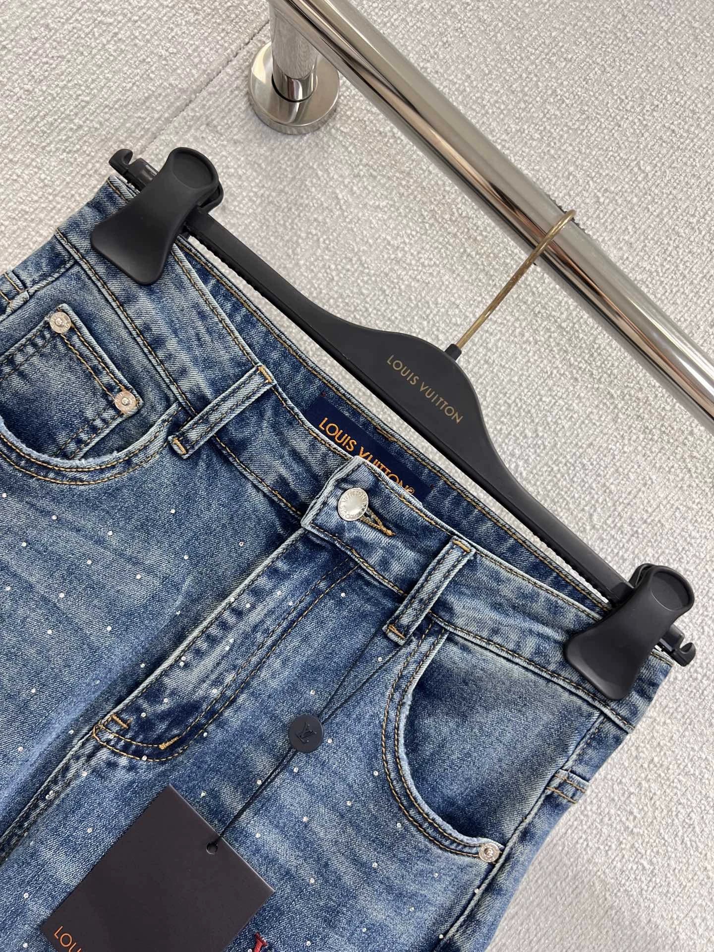 25FW rhinestone logo embroidered denim pants