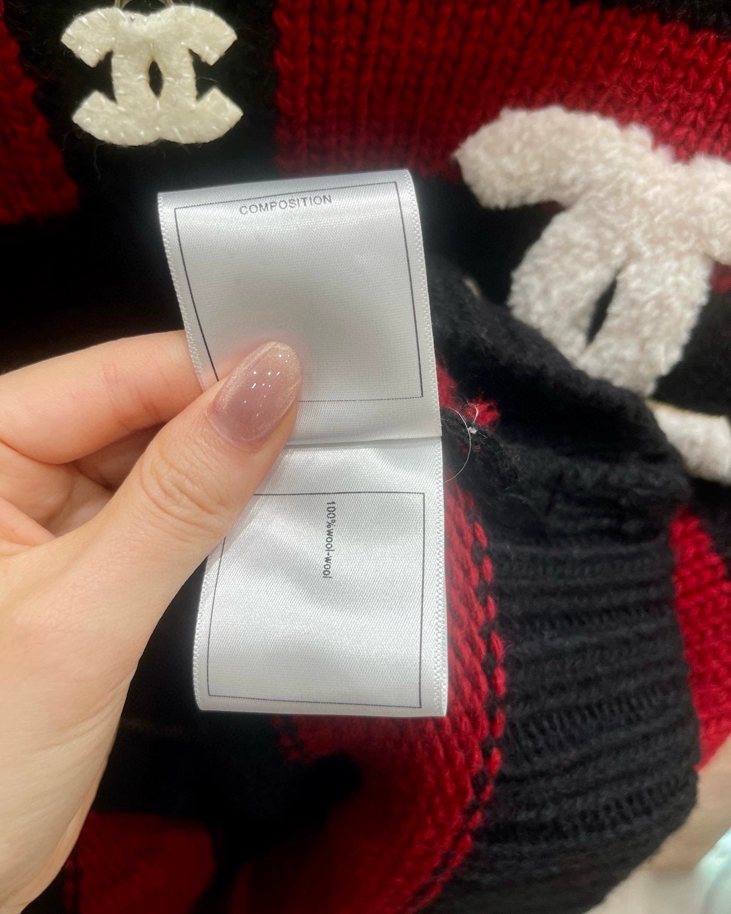 Red and black striped knitted cardigan