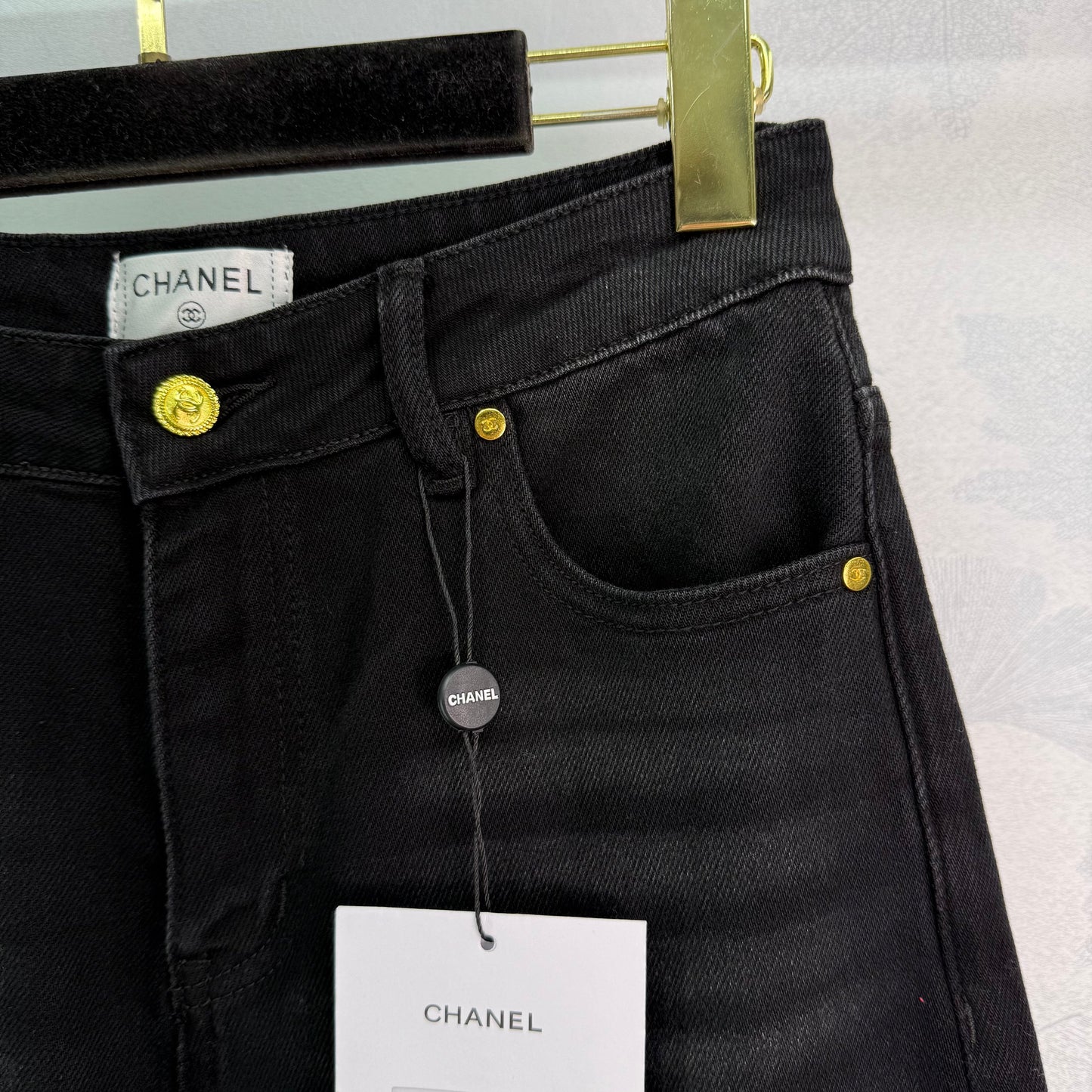 New style straight leg jeans with gold buttons