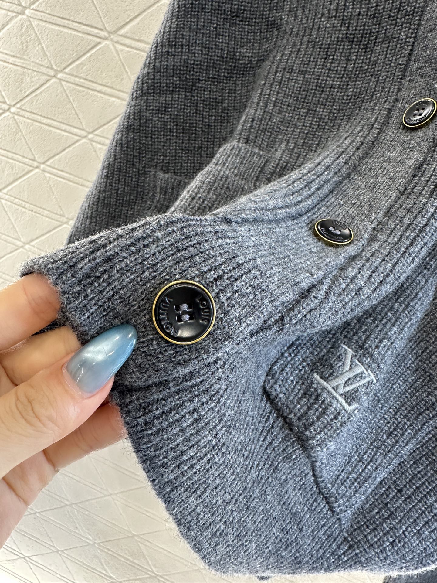 25fw Embroidered pocket knit cardigan with silhouette letters