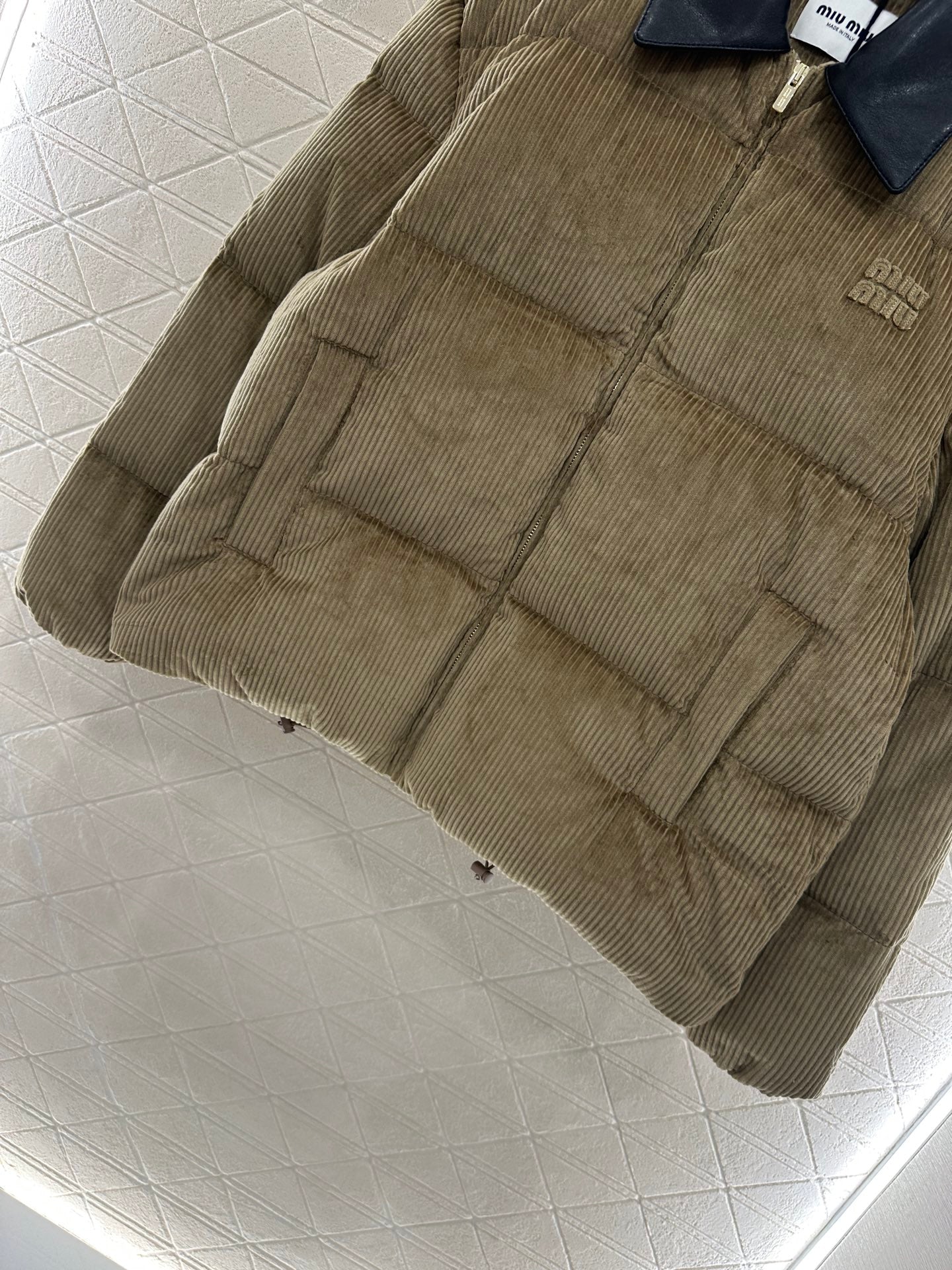 Leather collar corduroy down jacket