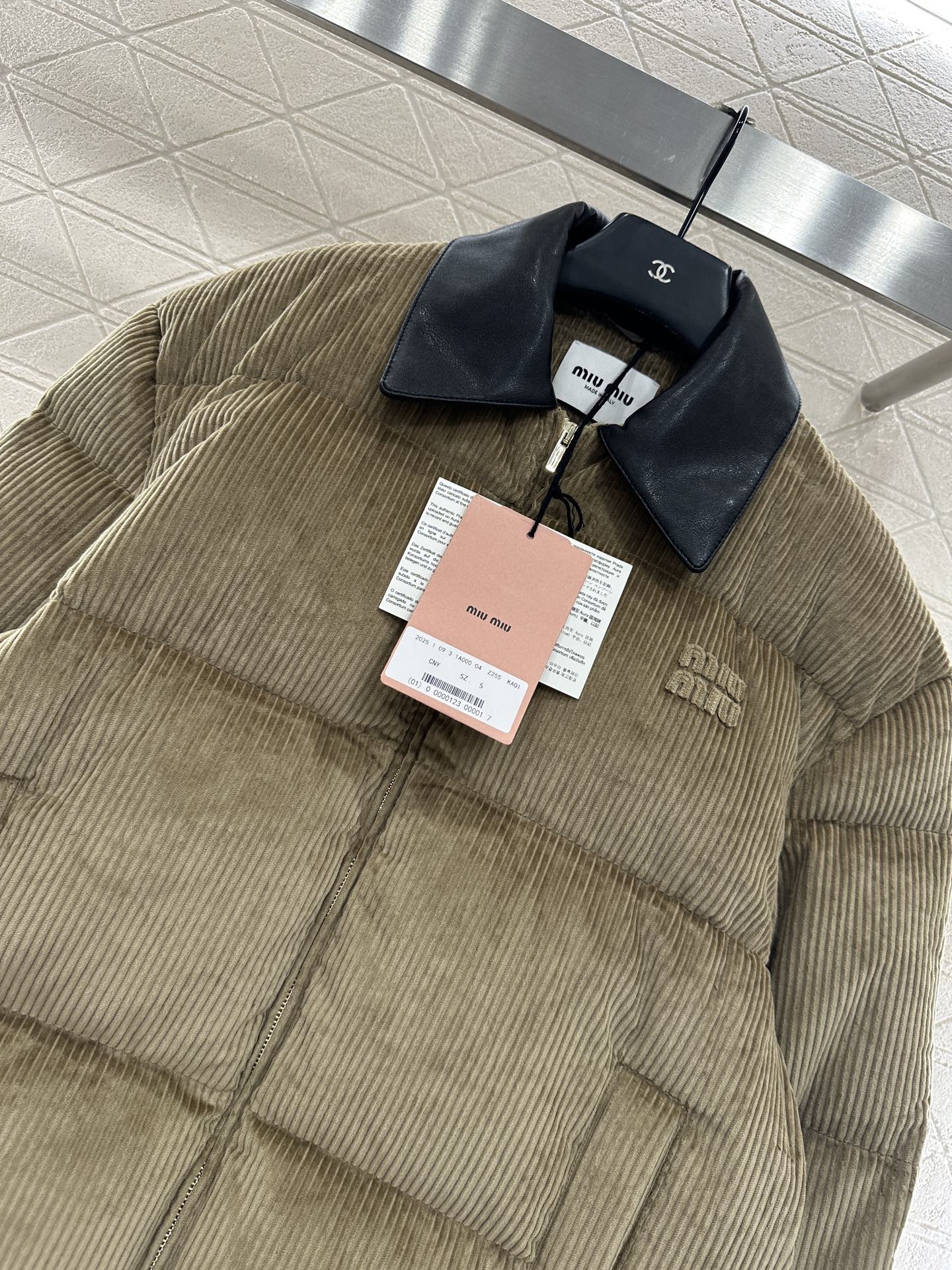 Leather collar corduroy down jacket