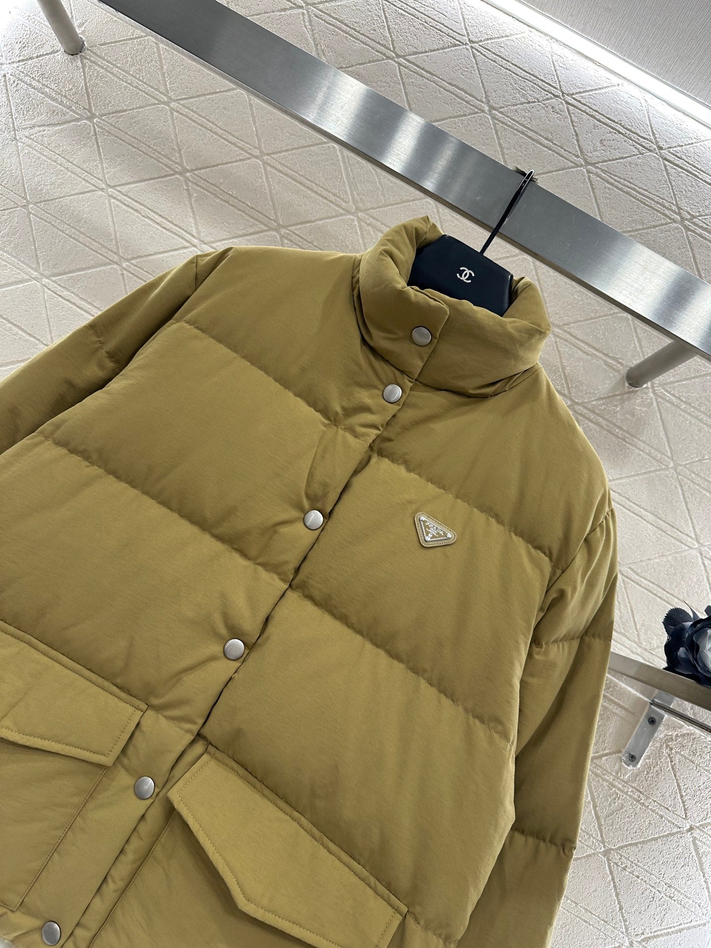 Rectangular embossed stand up collar down jacket