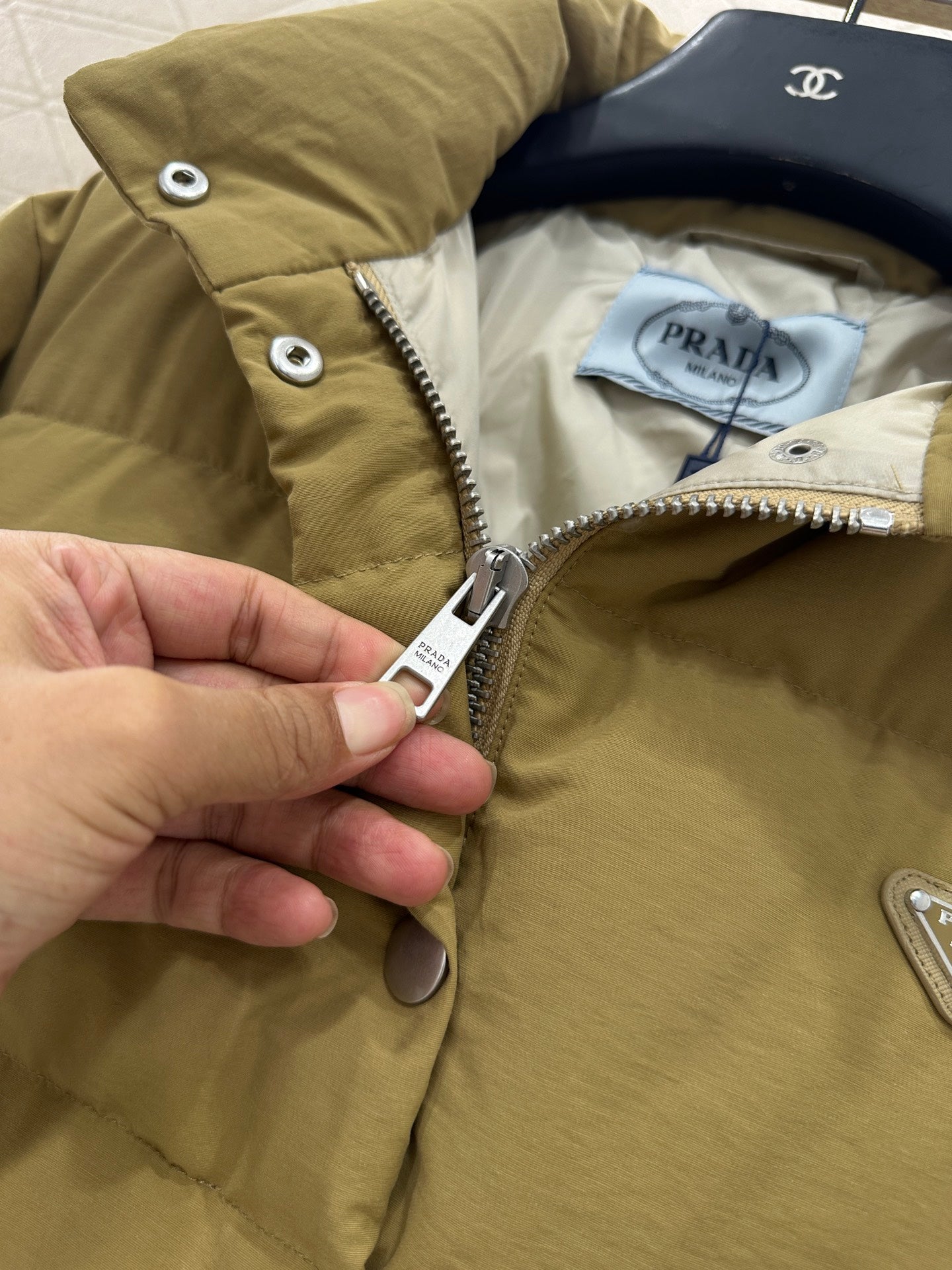 Rectangular embossed stand up collar down jacket