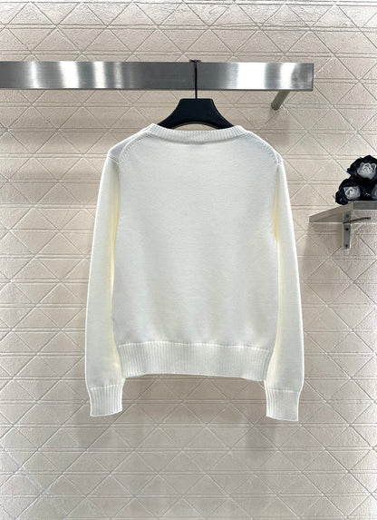 Round-neck lace-up sweater with bow