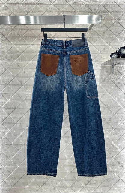 Spliced leather curved knife denim pants