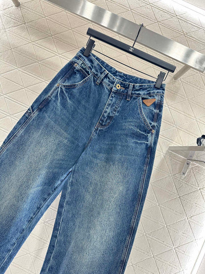 Spliced leather curved knife denim pants