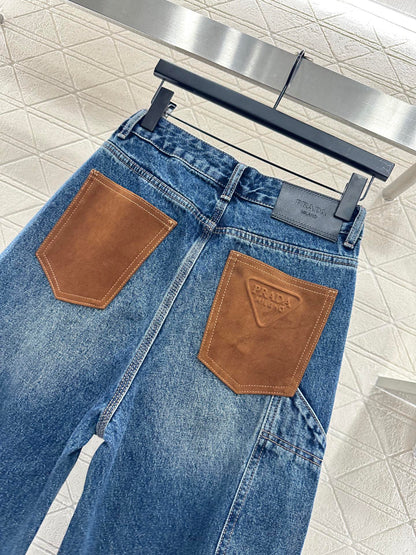 Spliced leather curved knife denim pants