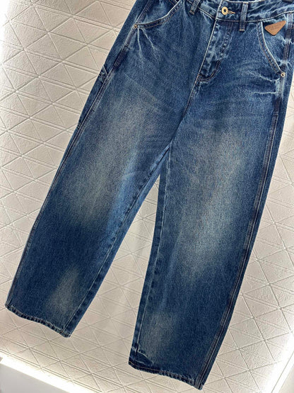 Spliced leather curved knife denim pants