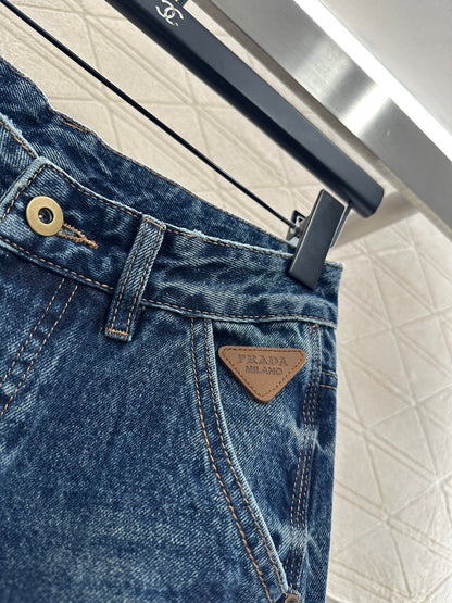 Spliced leather curved knife denim pants