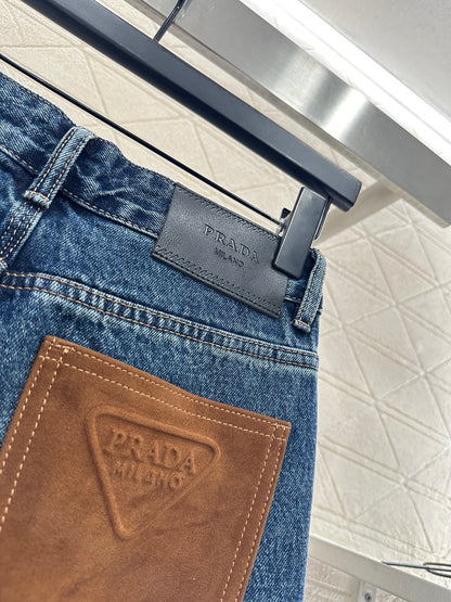 Spliced leather curved knife denim pants