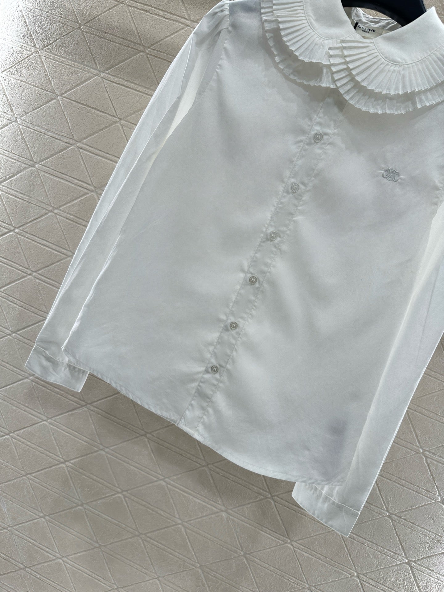 Stacked organ pleated lapel shirt