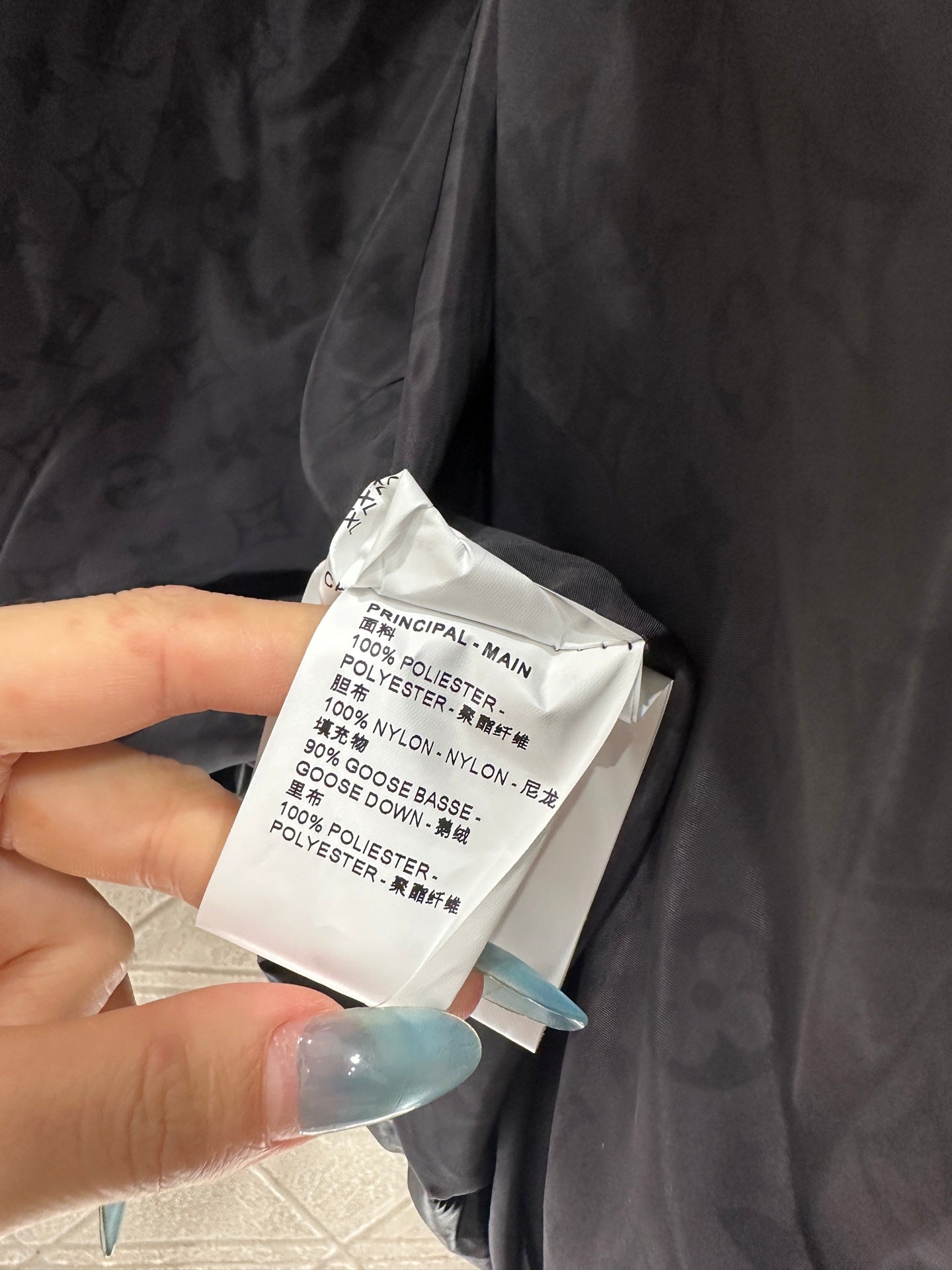 Embossed stand up collar down jacke