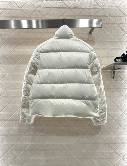 Embossed stand up collar down jacke