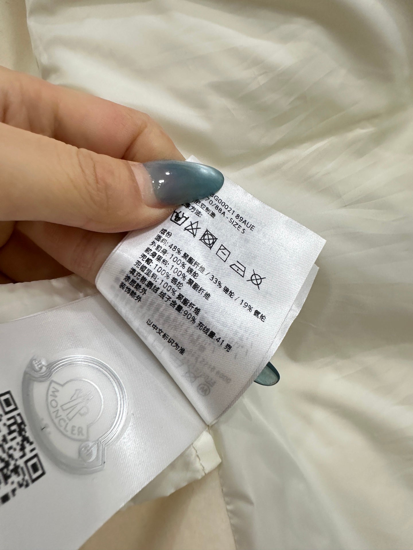 Splicing hooded down jacket