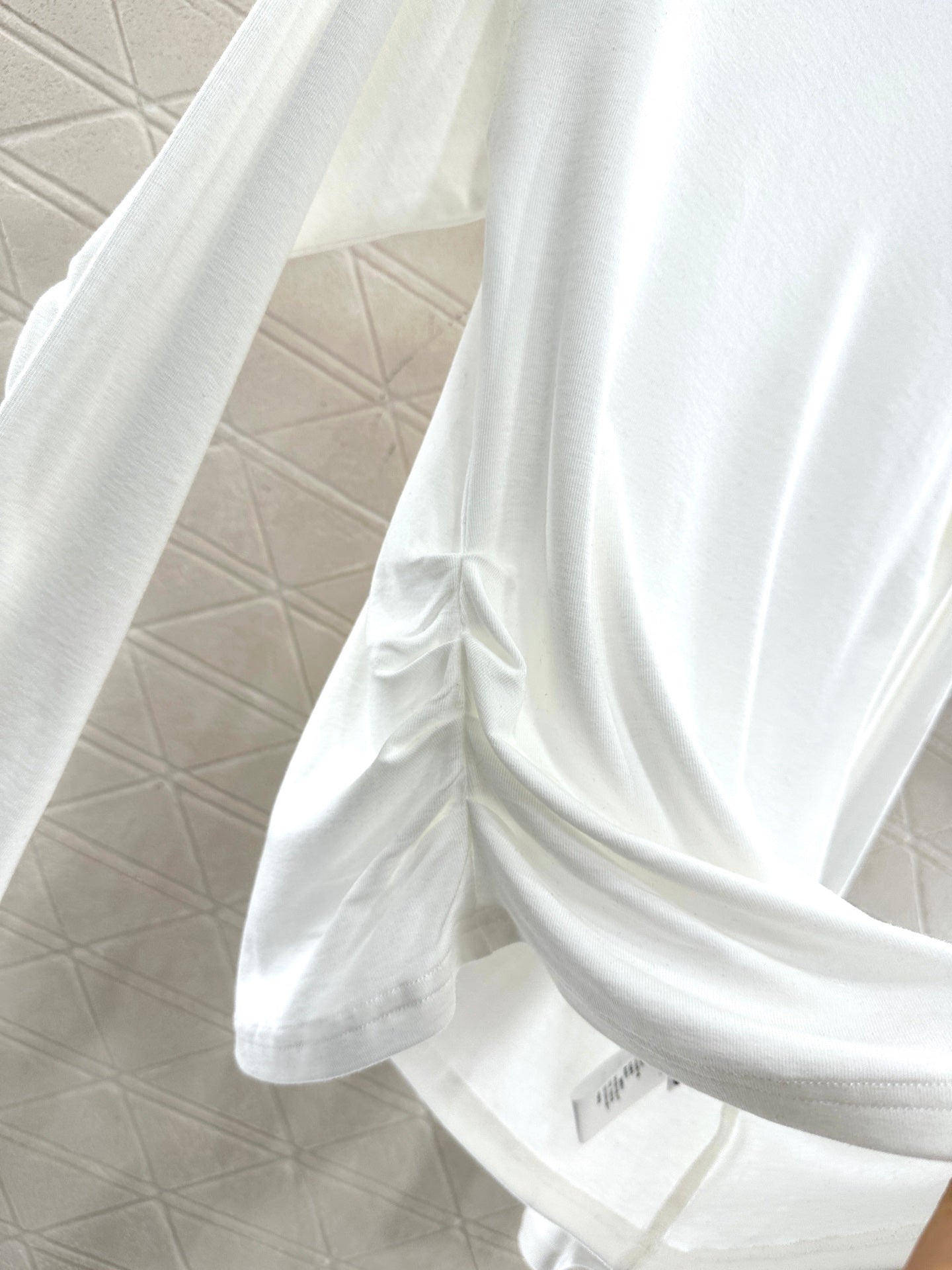 Single shoulder strap top