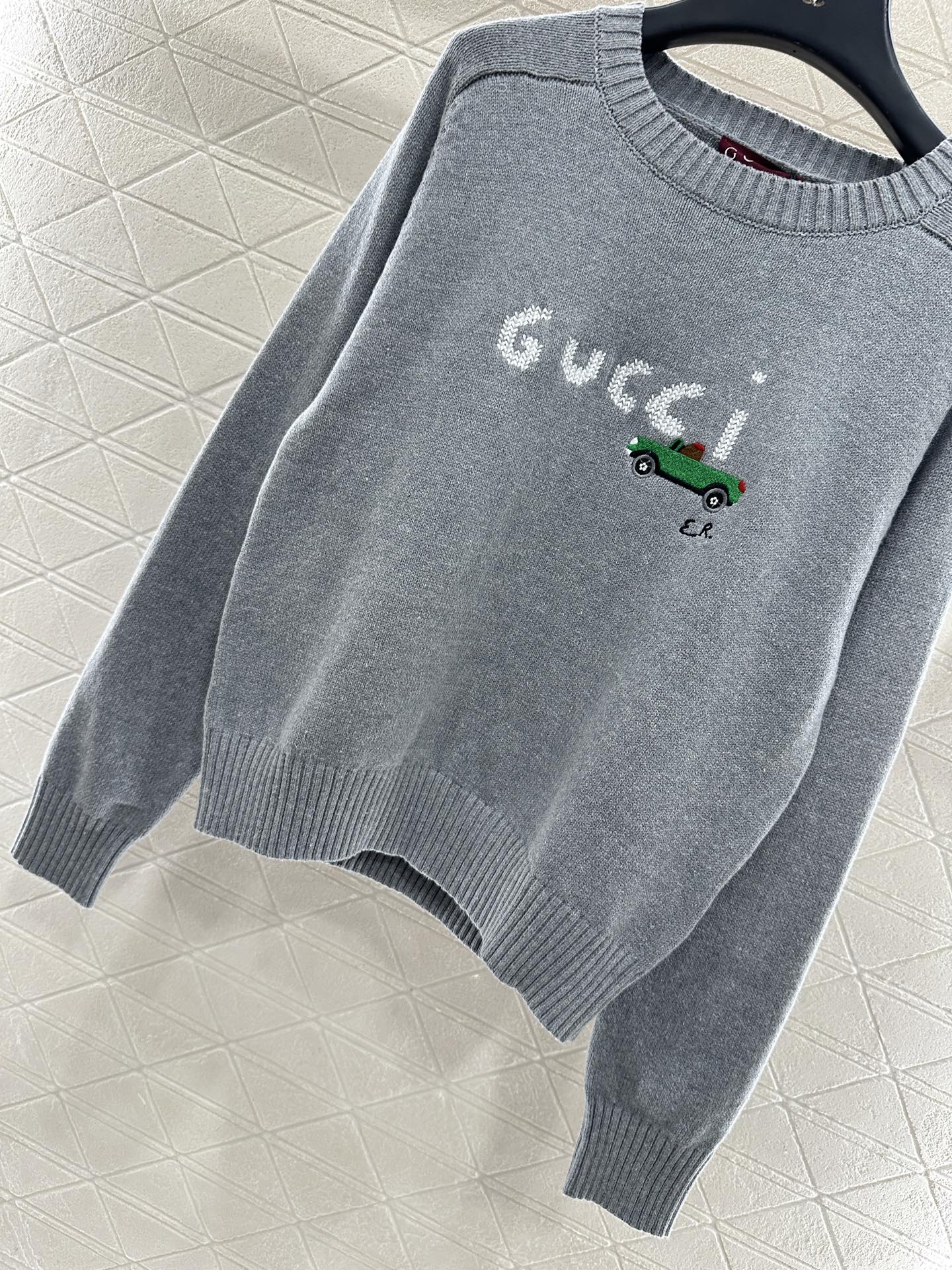 Embroidered crochet sweater