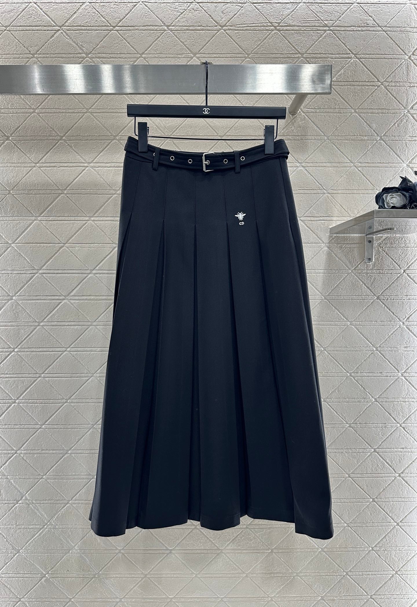 Mid length pleated skirt with waist belt