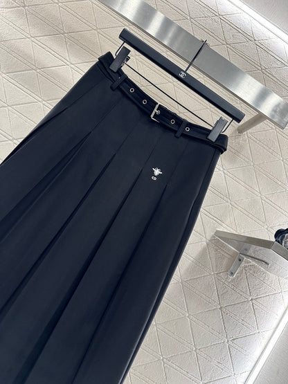 Mid length pleated skirt with waist belt