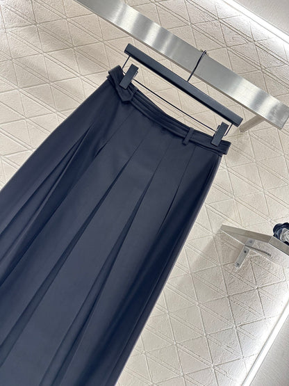 Mid length pleated skirt with waist belt