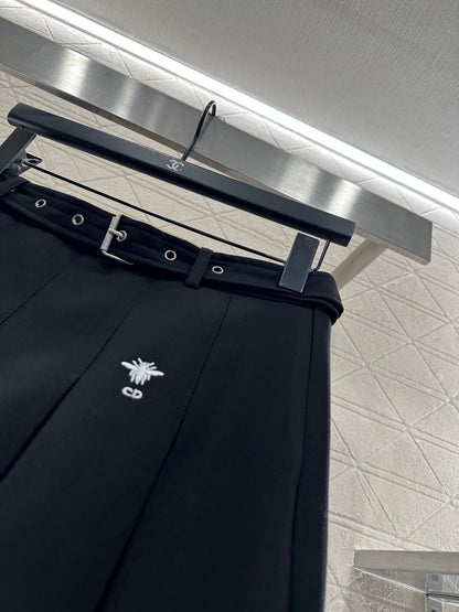 Mid length pleated skirt with waist belt