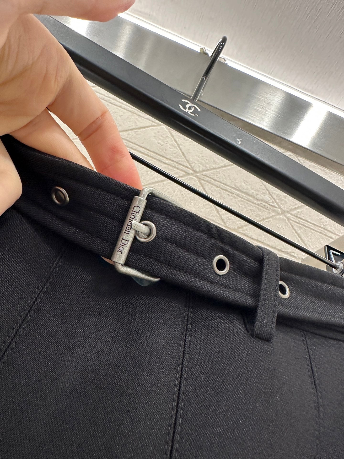 Mid length pleated skirt with waist belt