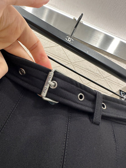 Mid length pleated skirt with waist belt