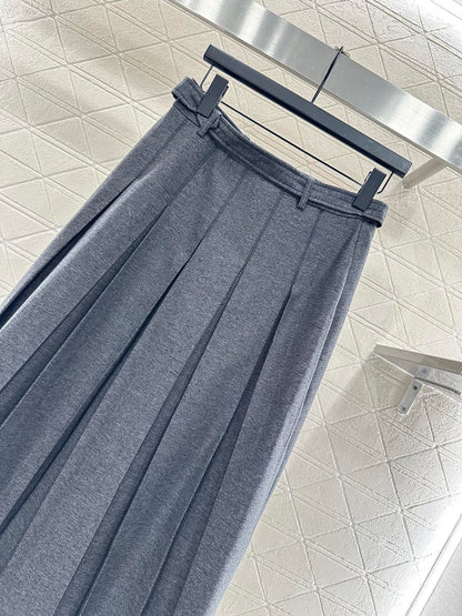 Mid length pleated skirt with waist belt