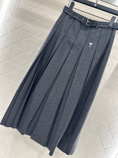Mid length pleated skirt with waist belt