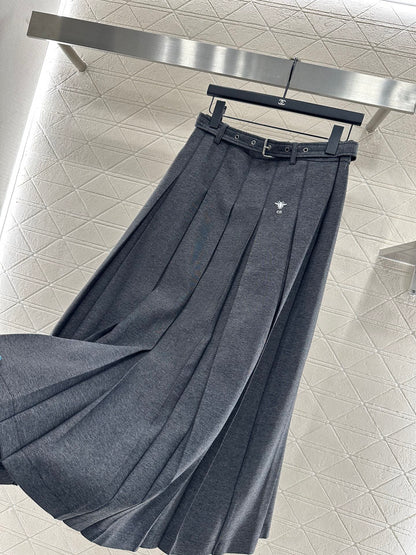 Mid length pleated skirt with waist belt