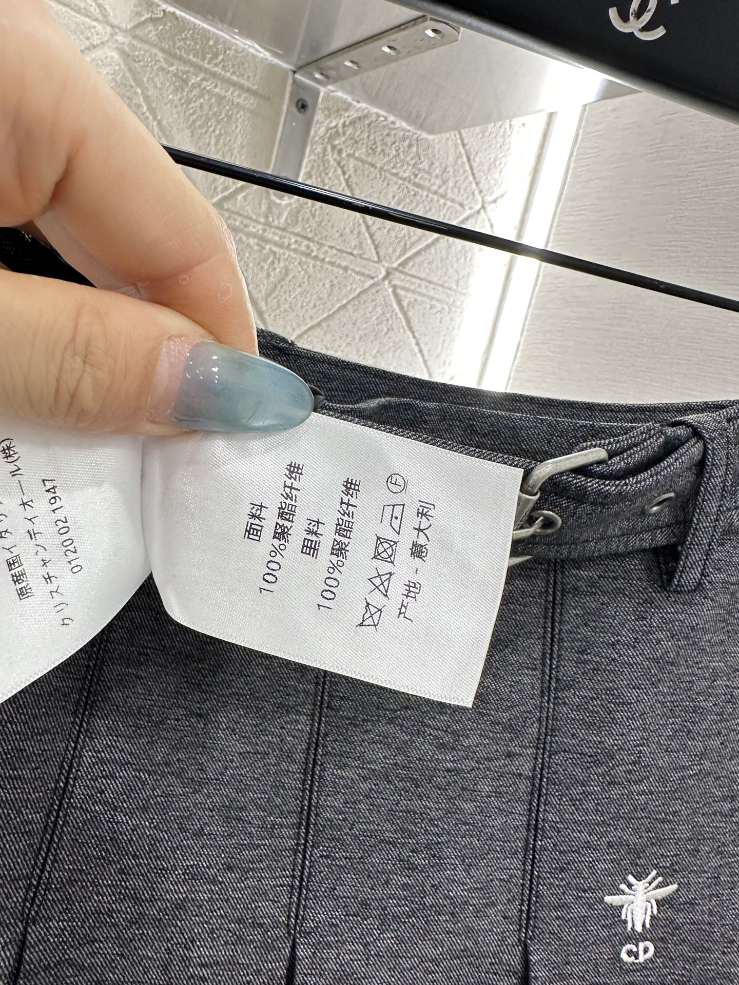 Mid length pleated skirt with waist belt