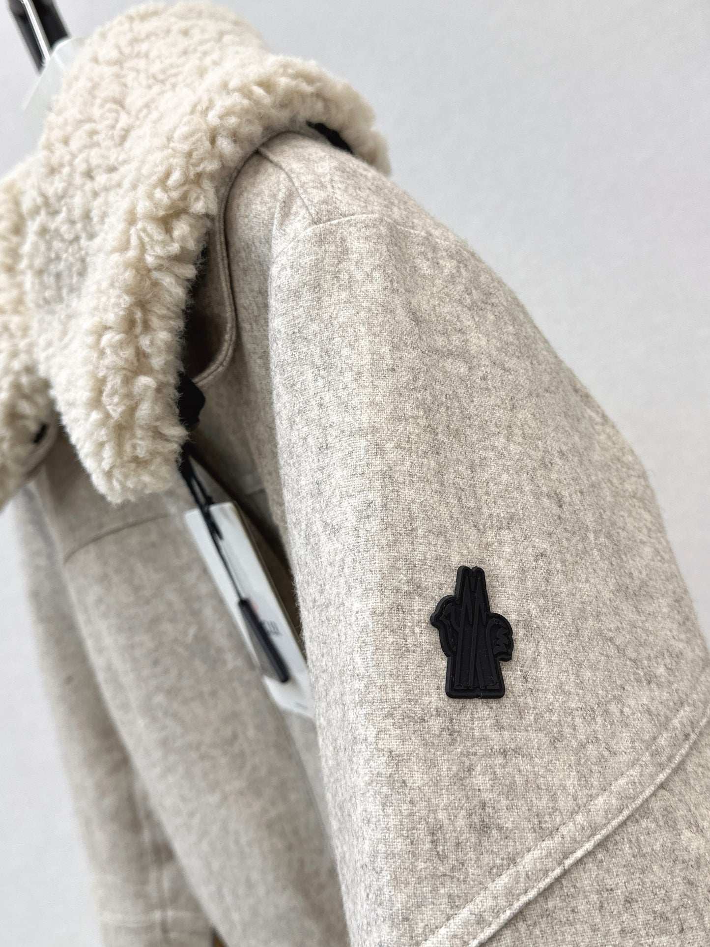 Lamb fur collar waistband hooded down jacket