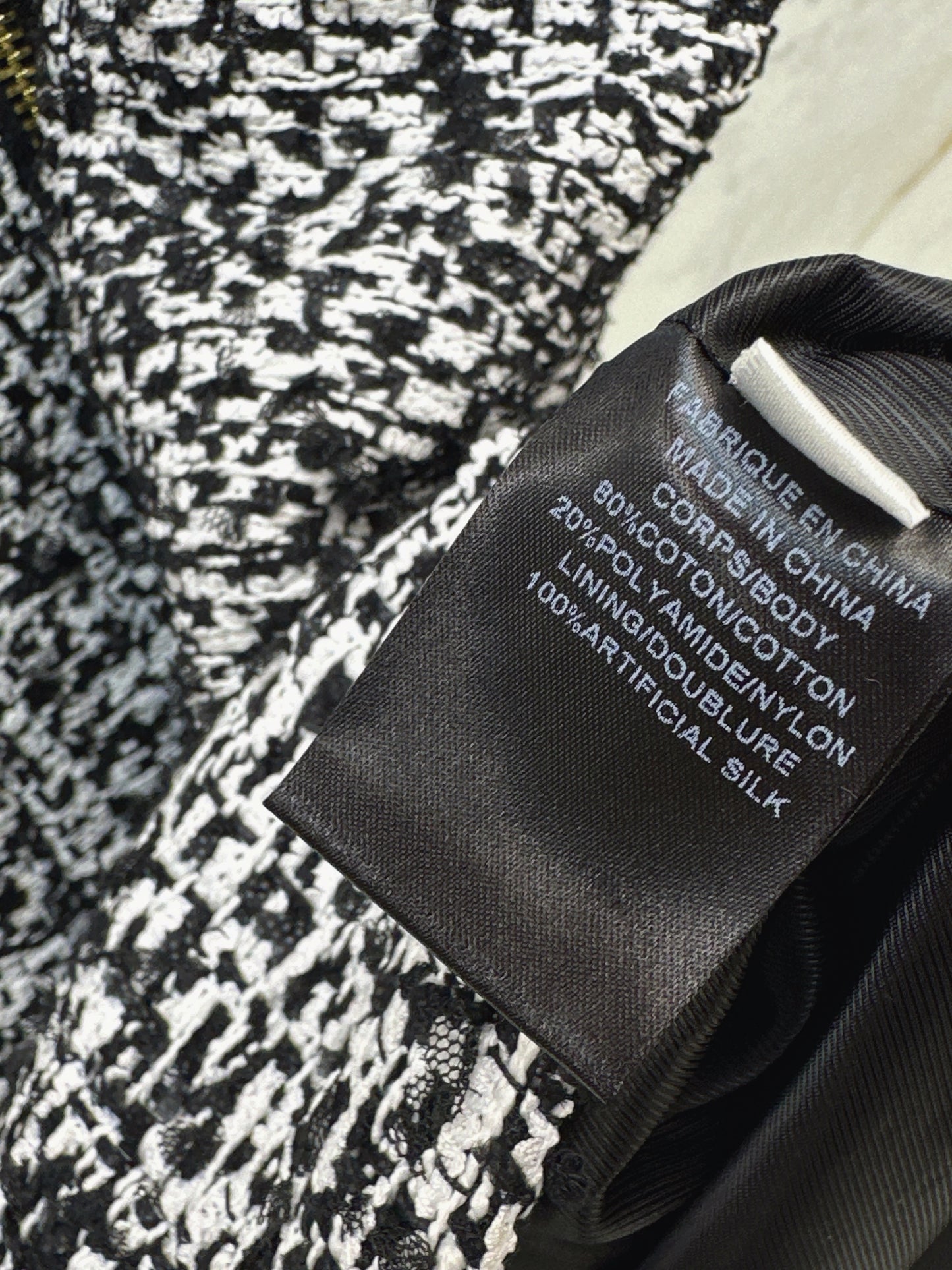 Coarse tweed pleated sleeveless dress