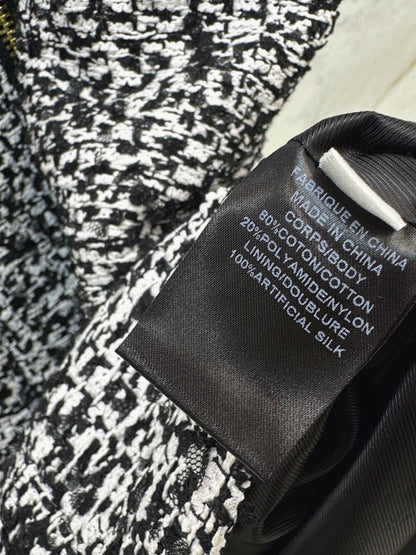 Coarse tweed pleated sleeveless dress