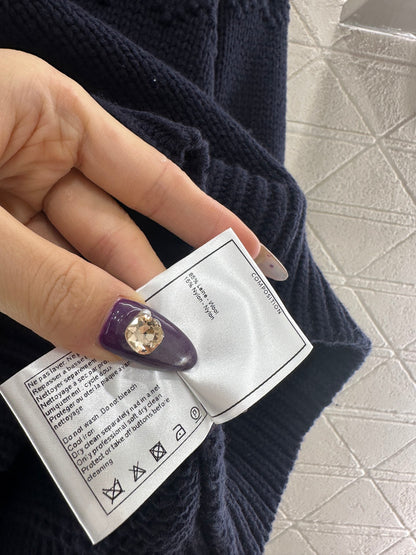 Embroidered crochet sweater