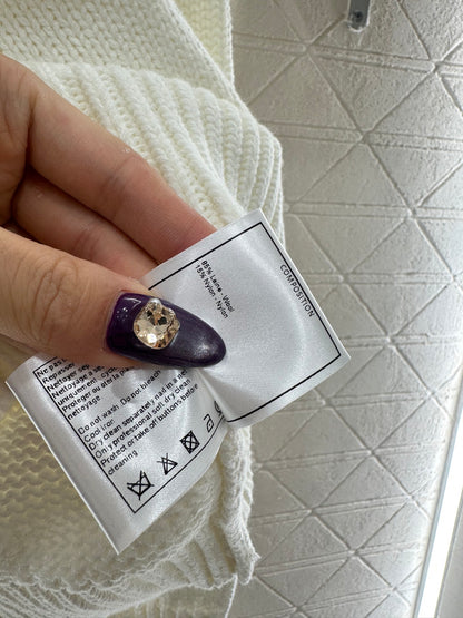 Embroidered crochet sweater