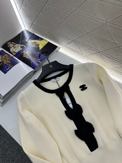 Hollow bow long sleeves