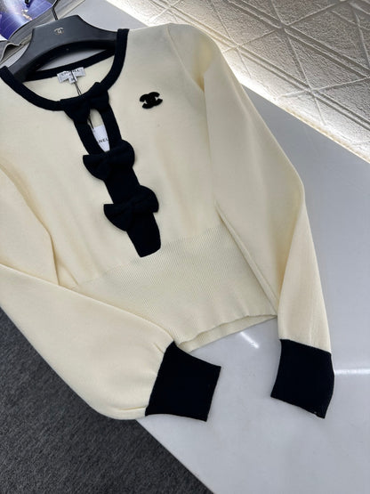 Hollow bow long sleeves