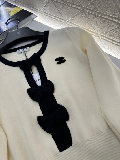 Hollow bow long sleeves