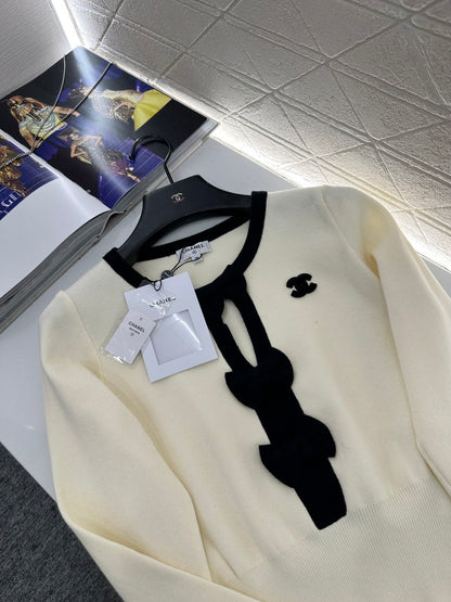 Hollow bow long sleeves