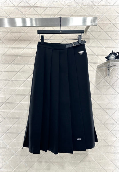 Mid length pleated skirt with waist belt