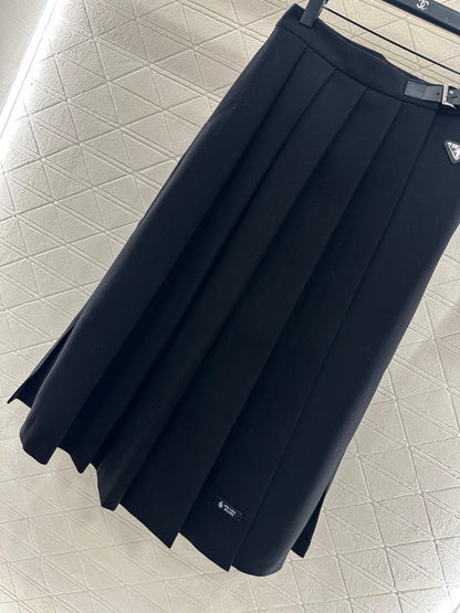 Mid length pleated skirt with waist belt