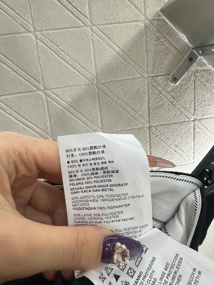 Mid length pleated skirt with waist belt