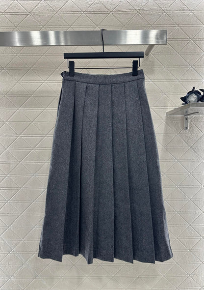 Mid length pleated skirt with waist belt