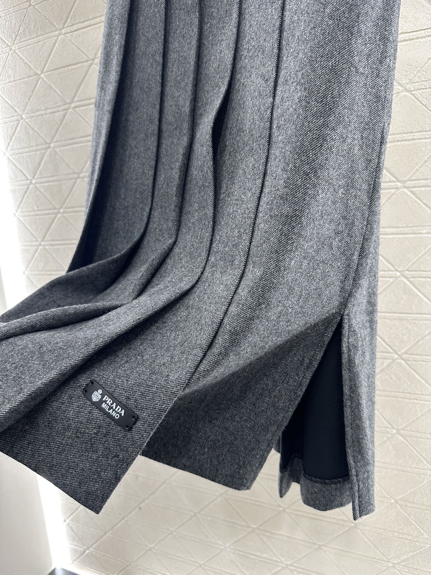 Mid length pleated skirt with waist belt