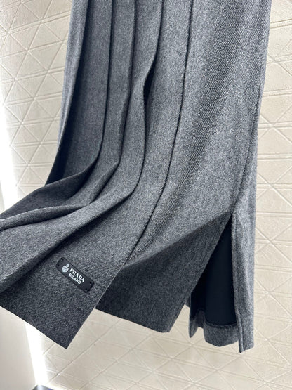 Mid length pleated skirt with waist belt