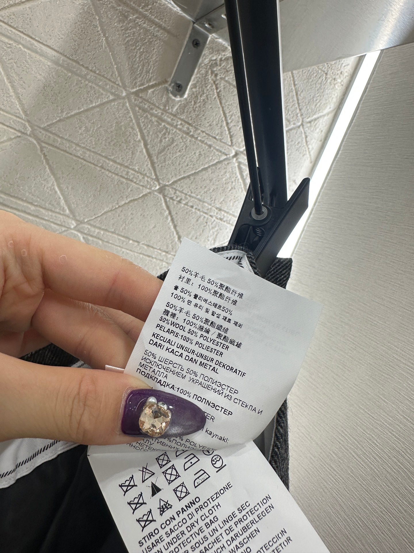 Mid length pleated skirt with waist belt